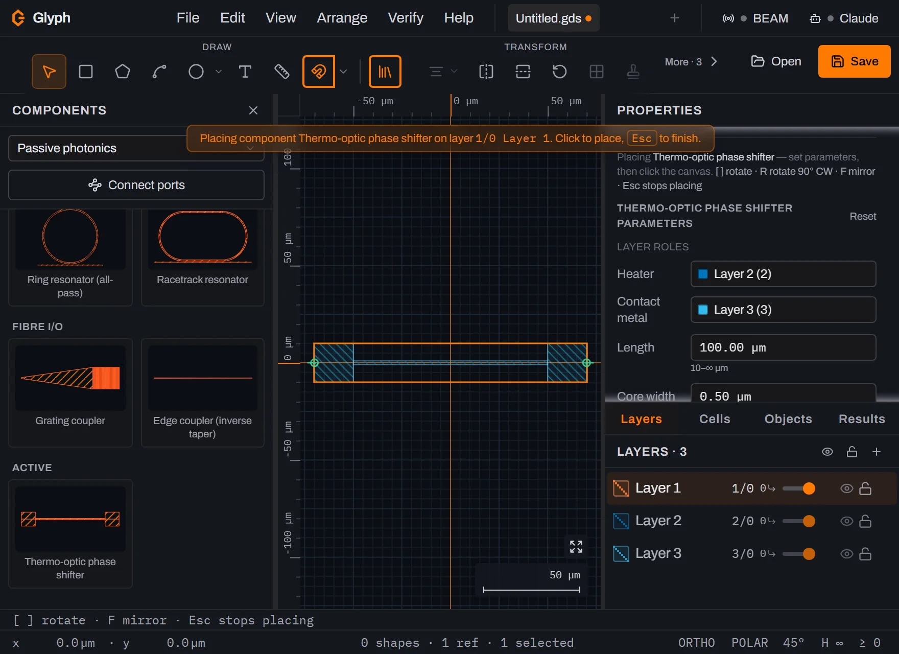 A placed thermo-optic phase shifter in Glyph: the waveguide core, a heater strip above it, and two contact pads, each rendered on its own distinct GDS layer.