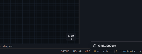Glyph's canvas corner showing grid lines, the right-hand panel edge and the status bar for location context, with the scale bar reading 1 micrometre above a short ruler and a toast reading Grid 1.000 micrometres nearby.